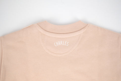 Babypullover 'Weck Worscht Woi' – orange Charles