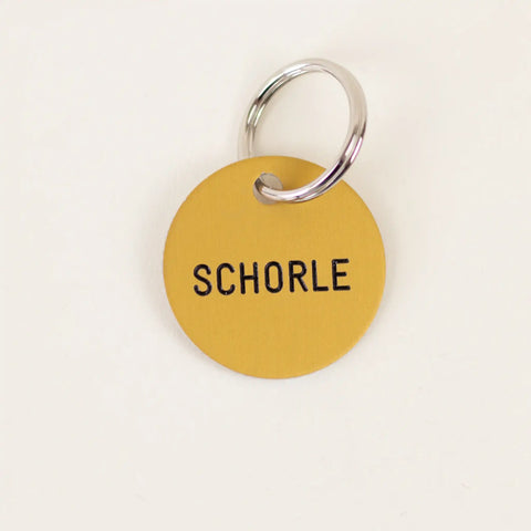 Schlüsselanhänger 'Schorle' gold Familie von Quast