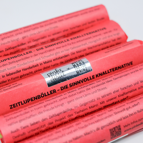 Kerze 'Zeitlupenböller' pinke distel