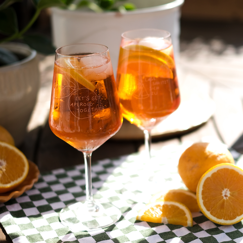 Aperolglas 'Let's get aperold together' pinke distel