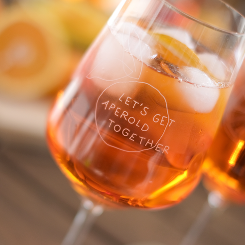 Aperolglas 'Let's get aperold together' pinke distel