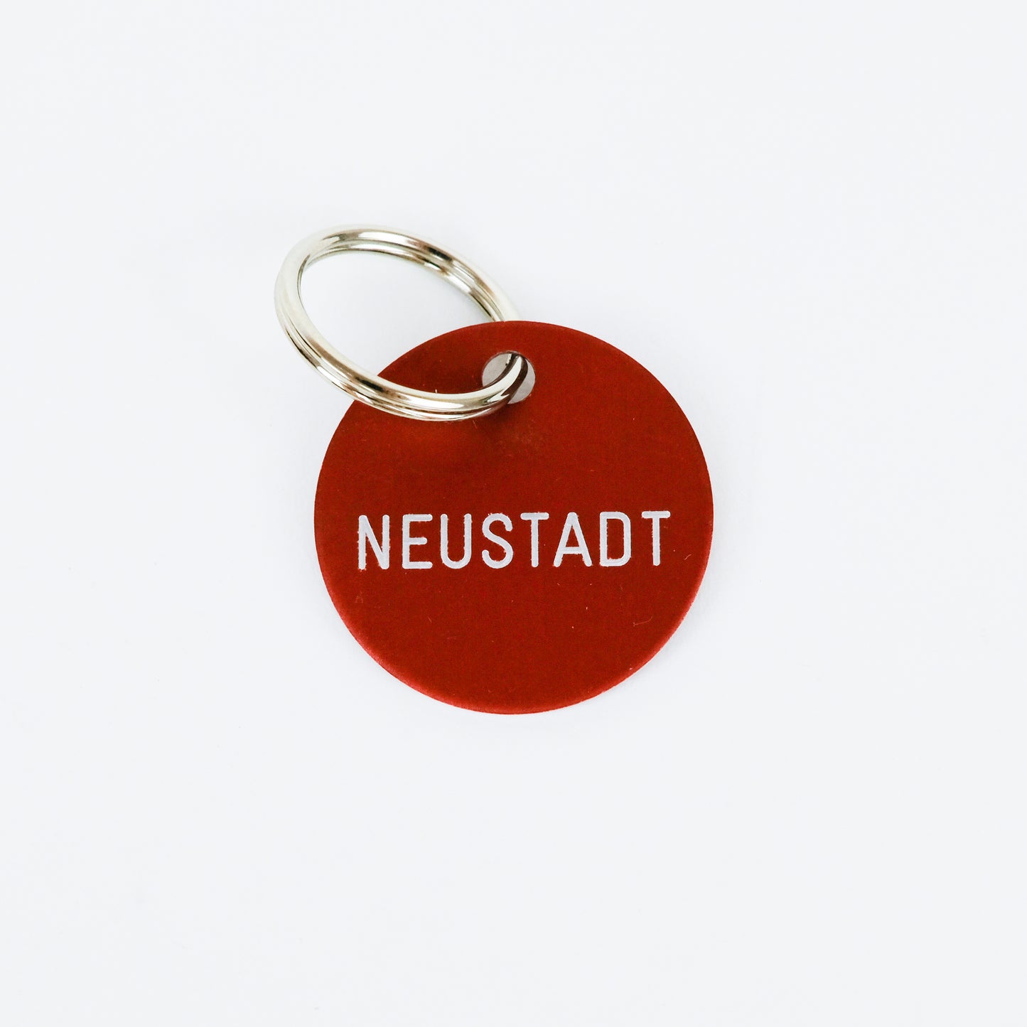 Schlüsselanhänger 'Neustadt' rot Familie von Quast