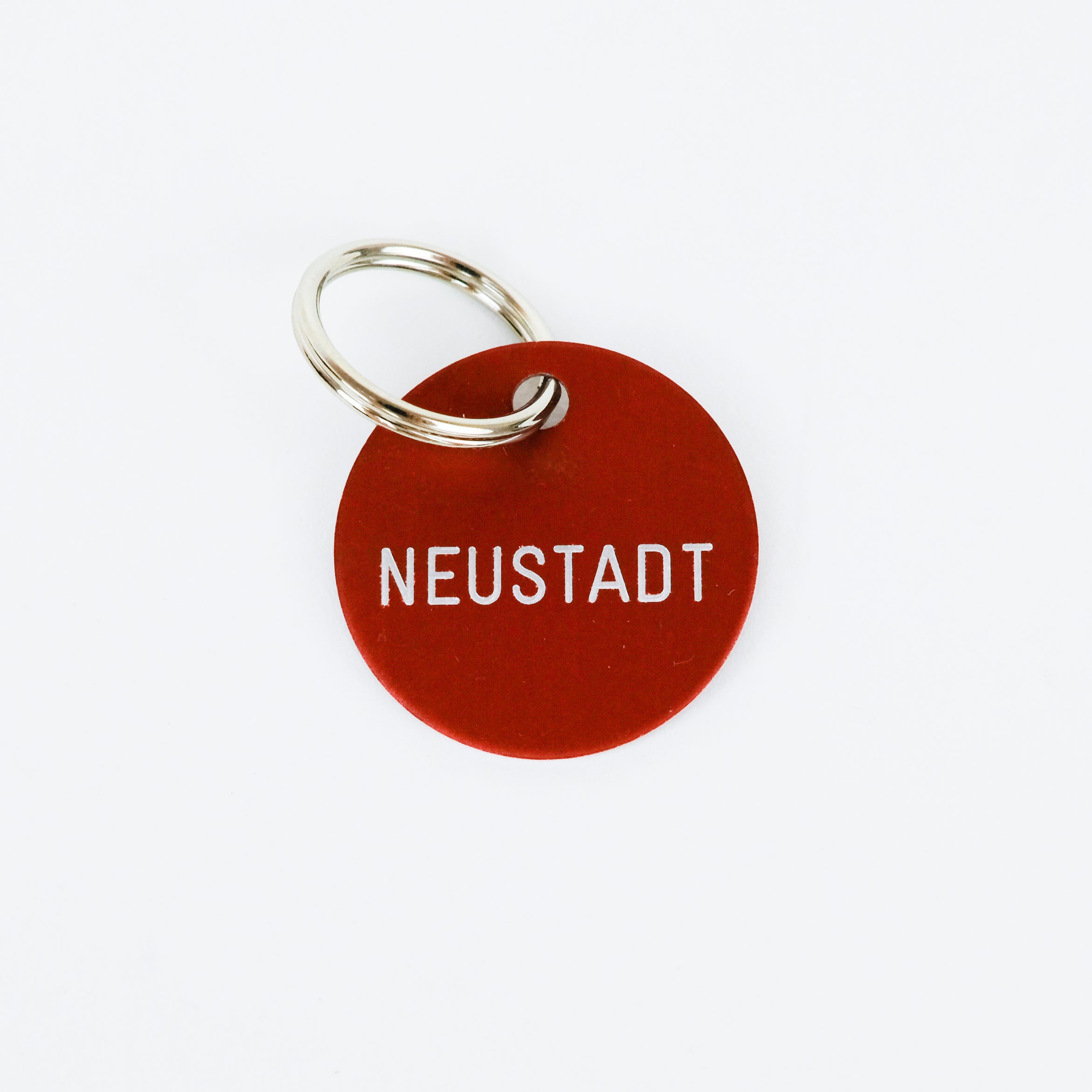 Schlüsselanhänger 'Neustadt' rot Familie von Quast