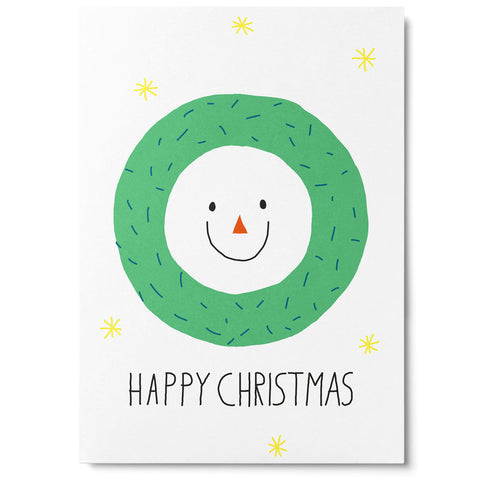 Postkarte 'Happy Christmas' – Gesicht mit Weihnachtskranz Unter Pinien