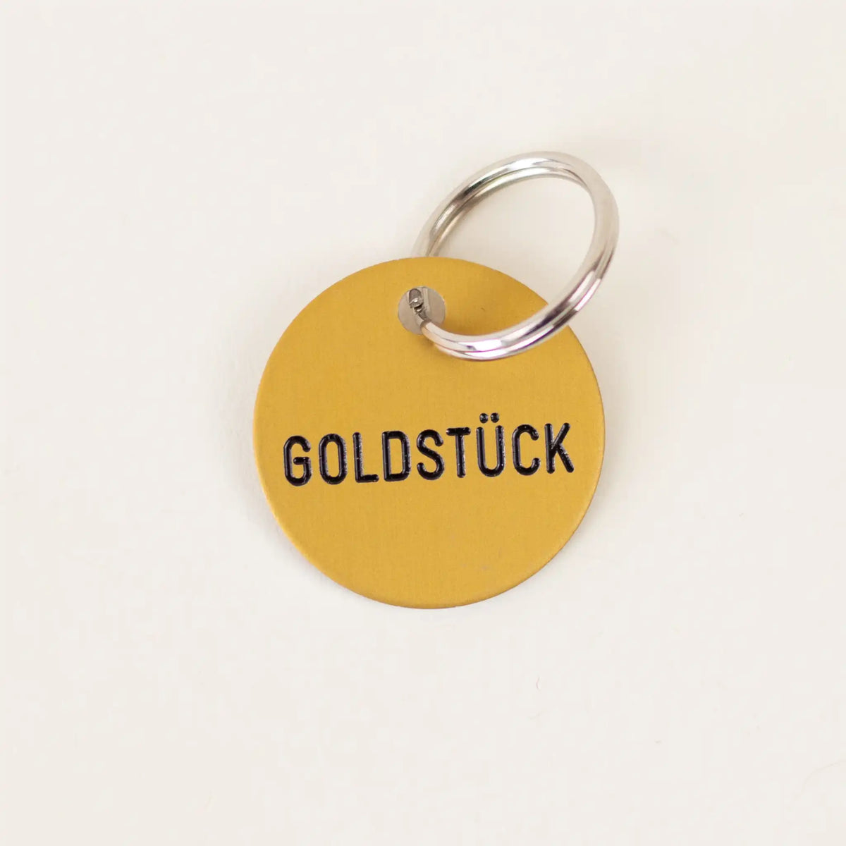 Schlüsselanhänger 'Goldstück' Familie von Quast