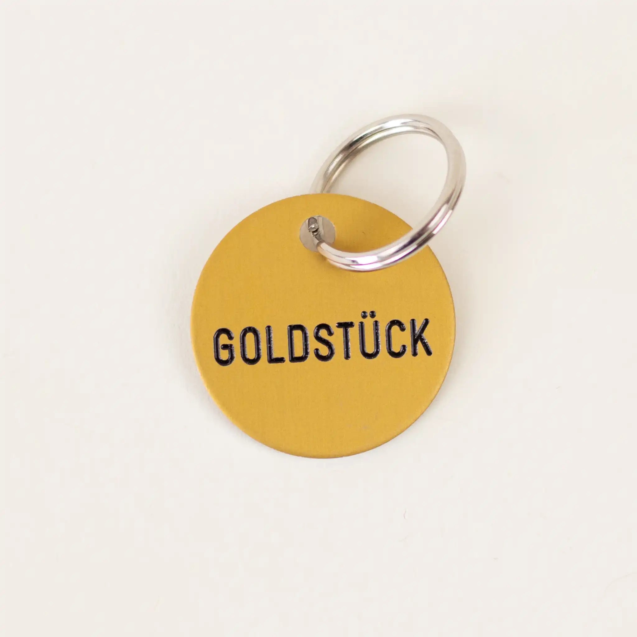 Schlüsselanhänger 'Goldstück' Familie von Quast